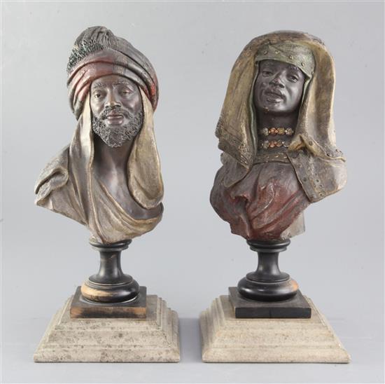 A pair of Austrian terracotta cold painted busts of Moors, overall 13.5in.